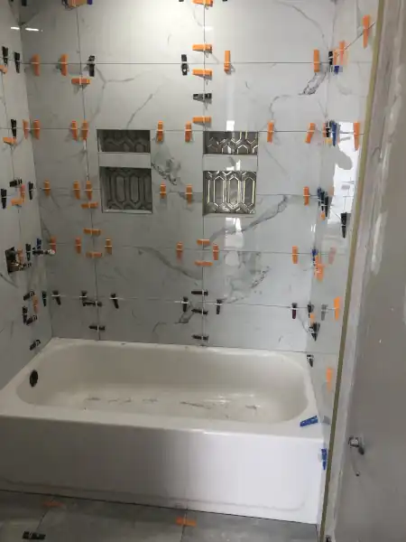 Tub deck tile installation in progress